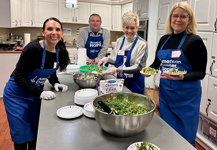 People cooking at hope lodge Rochester